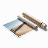 Desert landscape rolled canvas print showcasing vibrant orange and red hues with intricate details, packaged securely in a durable cardboard tube for safe delivery. This art piece captures the essence of arid terrains, ideal for enhancing home decor.