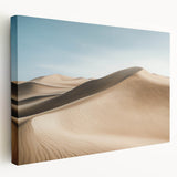 Desert landscape stretched canvas art featuring warm hues of orange and brown, showcasing a serene sunset over arid terrain, perfect for home decor.