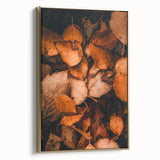 Framed canvas featuring a vintage poster of a fall landscape with golden and black tones, suitable for bedroom wall art.