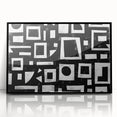Framed abstract wall art featuring dynamic strokes in black and white, designed to enhance modern interiors. Ideal for contemporary home decor.