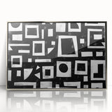 Framed abstract wall art featuring dynamic silver strokes on a white background, enhancing modern decor with a sleek, contemporary look. Perfect for living spaces or offices.