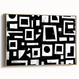 Framed canvas wall art featuring abstract strokes in gold and black, showcasing a modern design that adds elegance to home decor. Ideal for contemporary interiors.