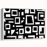 Framed canvas wall art showcasing abstract strokes in shades of white, gray, and black, designed to enhance modern home decor with a sleek side view. Ideal for contemporary interiors, this artwork adds a sophisticated touch to any space.