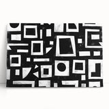 Abstract strokes wall art on stretched canvas, featuring vibrant hues of blue, orange, and yellow, leaning against a neutral wall, perfect for modern decor.