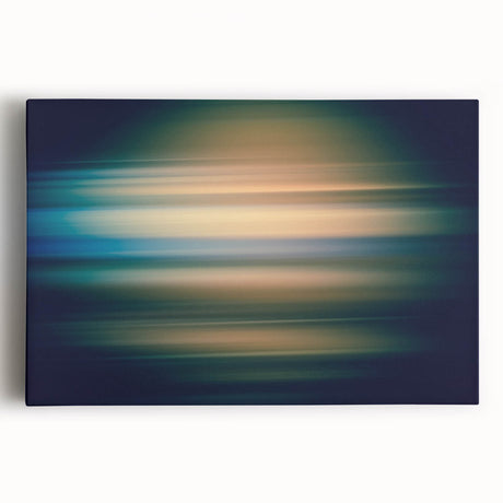 Abstract wall art featuring vibrant strokes in shades of blue, pink, and gold on a stretched canvas. This modern design adds a stylish touch to any interior decor.