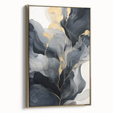 Framed canvas wall art showcasing abstract strokes in gold tones, set against a modern interior backdrop, adding a touch of elegance to home decor.