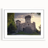 Elegant white-framed landscape artwork featuring a picturesque castle surrounded by lush greenery, perfect for home decor or office ambiance, showcasing intricate details and vibrant colors.