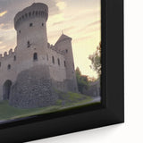 Close-up of a beautifully framed canvas depicting a picturesque landscape with a medieval castle, showcasing vibrant colors and intricate details, perfect for home decor.