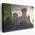 Stretched canvas artwork depicting a vibrant landscape with a majestic castle surrounded by lush greenery and rolling hills, showcasing rich colors and intricate details. Perfect for enhancing home decor with a touch of elegance and charm.