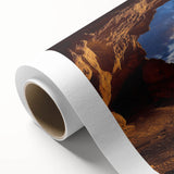 Rolled canvas showcasing a stunning landscape design with intricate cave formations, beautifully textured surface, and securely packaged in a durable cardboard tube for safe delivery.