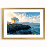 Framed landscape artwork showcasing dramatic cliffs with a gold mat, set against a neutral wall, perfect for enhancing home decor or office aesthetics.