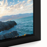 Close-up of a framed canvas showcasing a stunning cliff landscape with vibrant colors and intricate details, perfect for home decor enhancement.