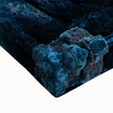 Close-up of a stretched canvas depicting a vibrant landscape with dramatic cliffs and lush greenery, showcasing rich colors and intricate details, ideal for home decor.