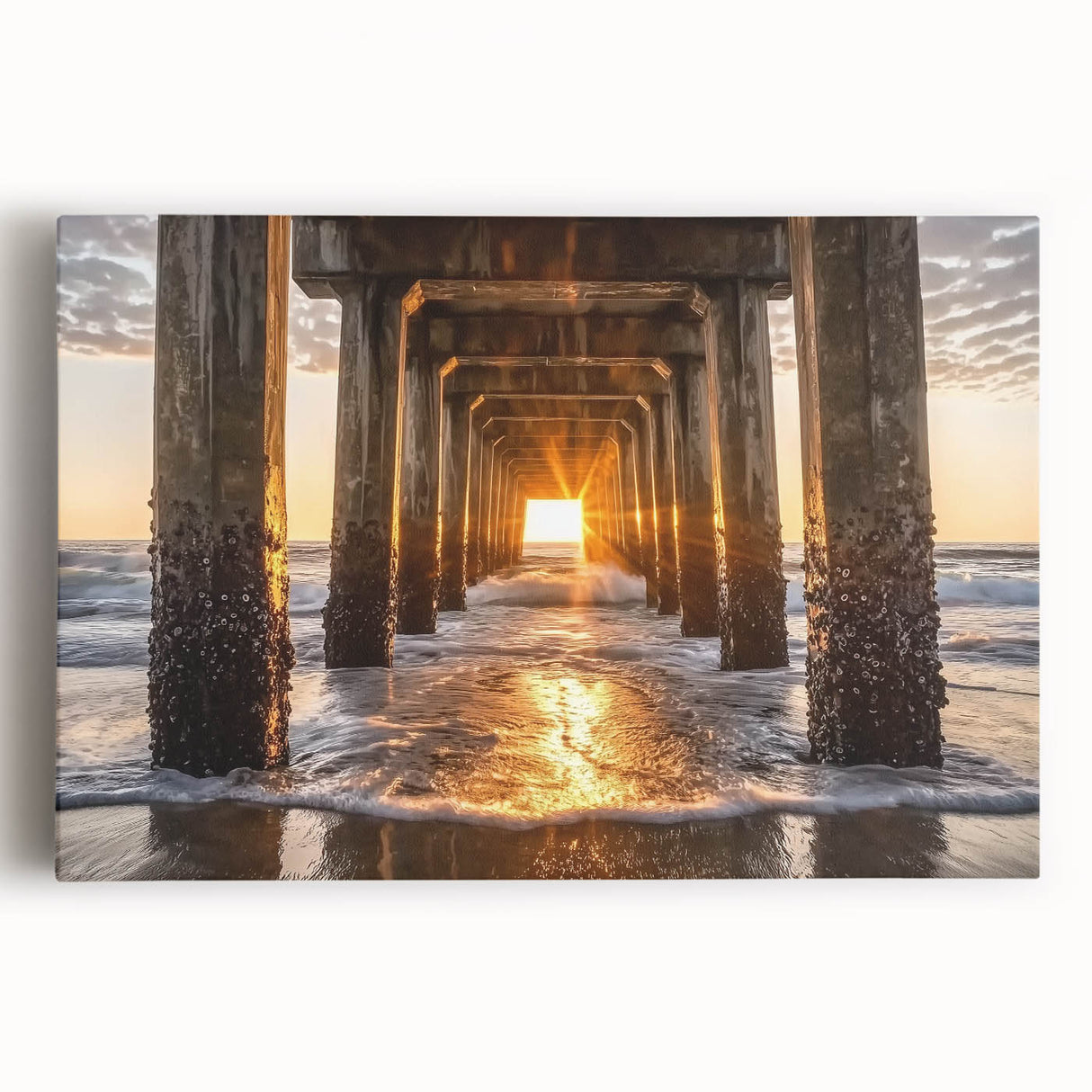 Stretched canvas artwork depicting a serene beach landscape at sunset, featuring vibrant orange and blue hues, ideal for coastal home decor. Perfect for creating a calming atmosphere in living spaces.