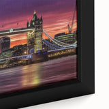 Close-up view of a framed landscape canvas print showcasing a serene bridge scene surrounded by lush greenery and vibrant colors, perfect for home decor.