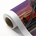 Rolled canvas showcasing a vibrant landscape bridge design with intricate details and rich colors, packaged securely in a protective cardboard tube.
