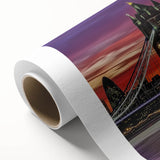 Rolled canvas showcasing a vibrant landscape bridge design with intricate details and rich colors, packaged securely in a protective cardboard tube.