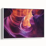 Framed canvas artwork depicting a stunning landscape of canyons, showcasing vibrant colors and intricate details. The piece is presented in a white frame, adding elegance to any room while enhancing the natural beauty of the desert scenery. Perfect for home decor enthusiasts looking to elevate their interior design with nature-inspired art.