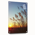 Acrylic glass artwork depicting a serene countryside landscape, showcasing vibrant greens and soft blues. The piece is mounted with pins for display, highlighting its contemporary design.