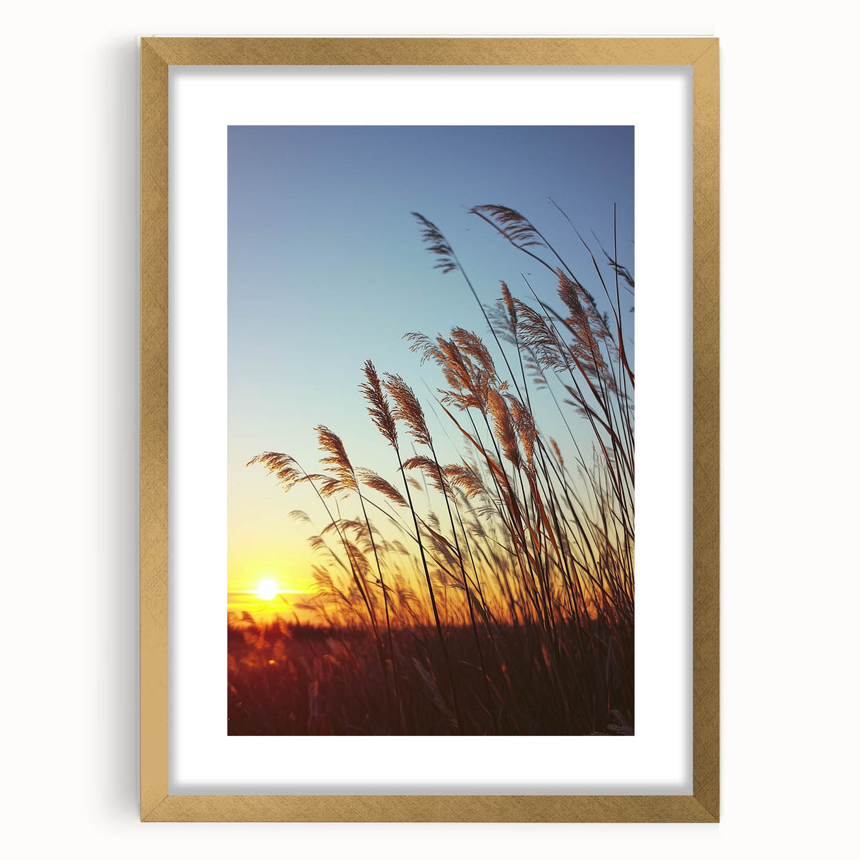 Elegant gold-framed landscape artwork depicting a serene countryside scene with lush greenery, rolling hills, and a clear blue sky, perfect for enhancing home decor.