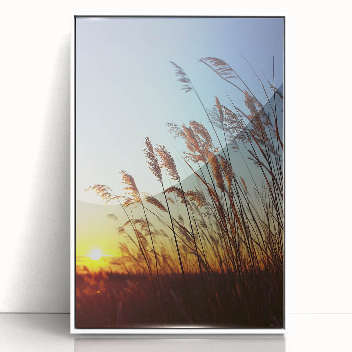 Framed acrylic landscape artwork showcasing a serene countryside view, featuring vibrant greens and blues, displayed in a sleek white frame, ideal for home decor.