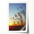 Vibrant rolled print showcasing a serene countryside landscape with rolling hills and a clear blue sky, elegantly packaged in a protective cardboard tube for easy transport.