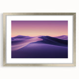 Framed desert landscape artwork with a silver mat, showcasing warm hues of orange and yellow against a serene blue sky, ideal for modern home decor.