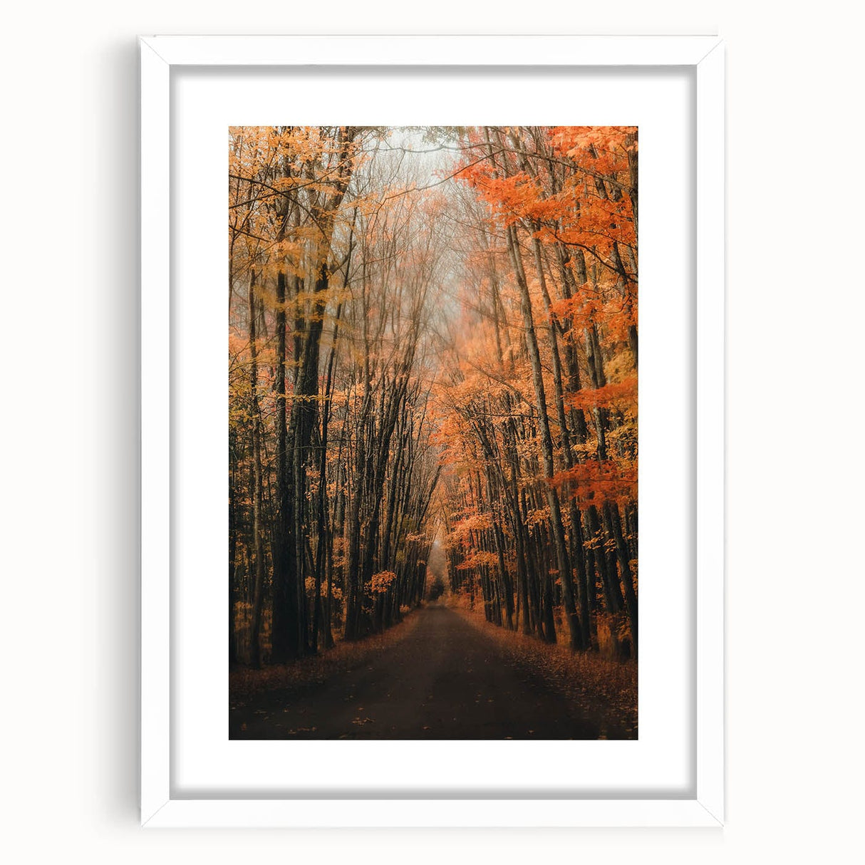 Abstract art print depicting autumn foliage in orange and red tones on a white framed canvas, suitable for dining room decor.