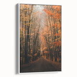 Vintage poster art of autumn trees in vibrant orange and red on a large framed canvas, ideal for living room decor.