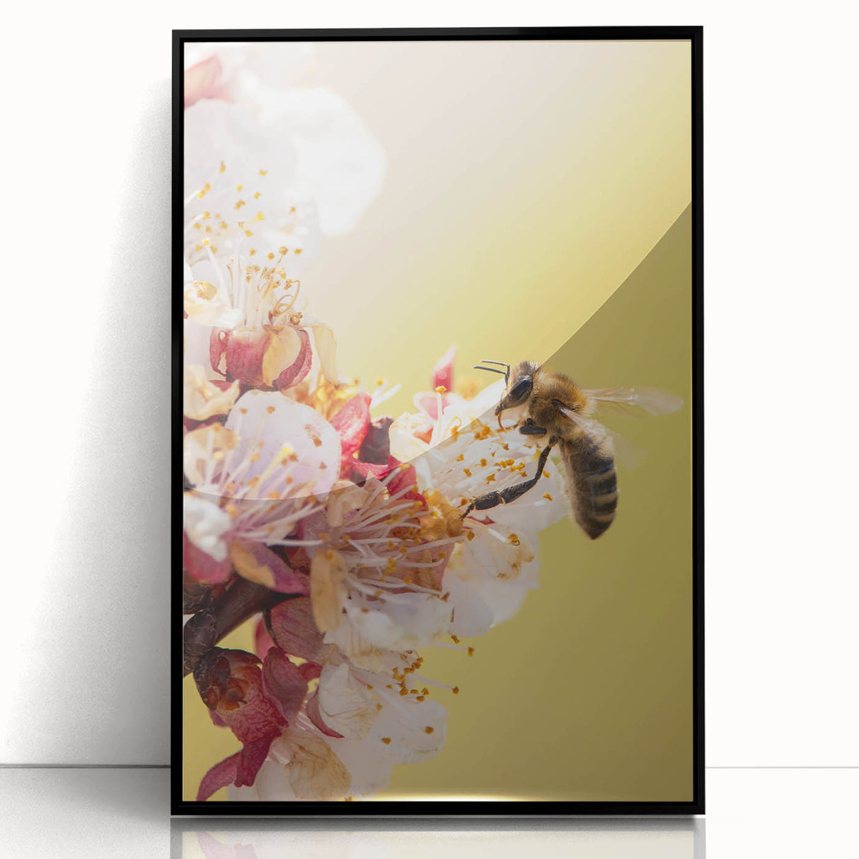Large abstract wall art featuring spring-themed colors in green and pink, acrylic print in black frame.