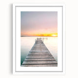 Abstract art print featuring swirling blue and green patterns on a white framed canvas, suitable for dining room decor.