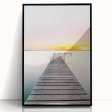 Large abstract wall art featuring swirling blue and green tones on acrylic, framed in black.