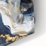 Close-up view of an abstract wall art piece displaying vibrant strokes in shades of blue, pink, and gold, printed on acrylic glass for a modern decor aesthetic.