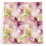 Abstract wall art featuring vibrant strokes in shades of blue, orange, and yellow on a stretched canvas, leaning against a neutral wall, adding a modern touch to home decor.