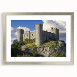 Elegant silver-framed landscape artwork of a serene castle scene, featuring a mat border that enhances the visual appeal, ideal for home decor.