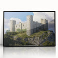 Framed acrylic artwork showcasing a stunning landscape with a castle, featuring a sleek black frame, perfect for home decor enthusiasts seeking elegant wall art.