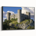 Framed canvas artwork showcasing a picturesque landscape with a majestic castle, elegantly displayed in a black frame, enhancing any interior decor. Perfect for adding a touch of sophistication to living spaces.