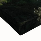 Close-up of a vibrant stretched canvas artwork depicting a majestic castle surrounded by lush landscapes, showcasing intricate details and rich colors, perfect for home decor.