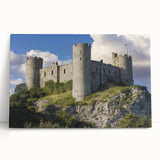 Stretched canvas artwork depicting a serene landscape with a majestic castle, featuring vibrant colors and intricate details, perfect for home decor.