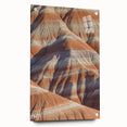Acrylic landscape artwork depicting dramatic cliffs, showcasing vibrant colors and intricate details, mounted on glass with stylish pins for modern decor.