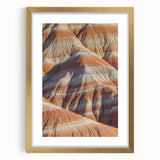 Elegant gold-framed landscape art print showcasing dramatic cliffs and serene ocean waves, perfect for enhancing modern home decor with a touch of nature.