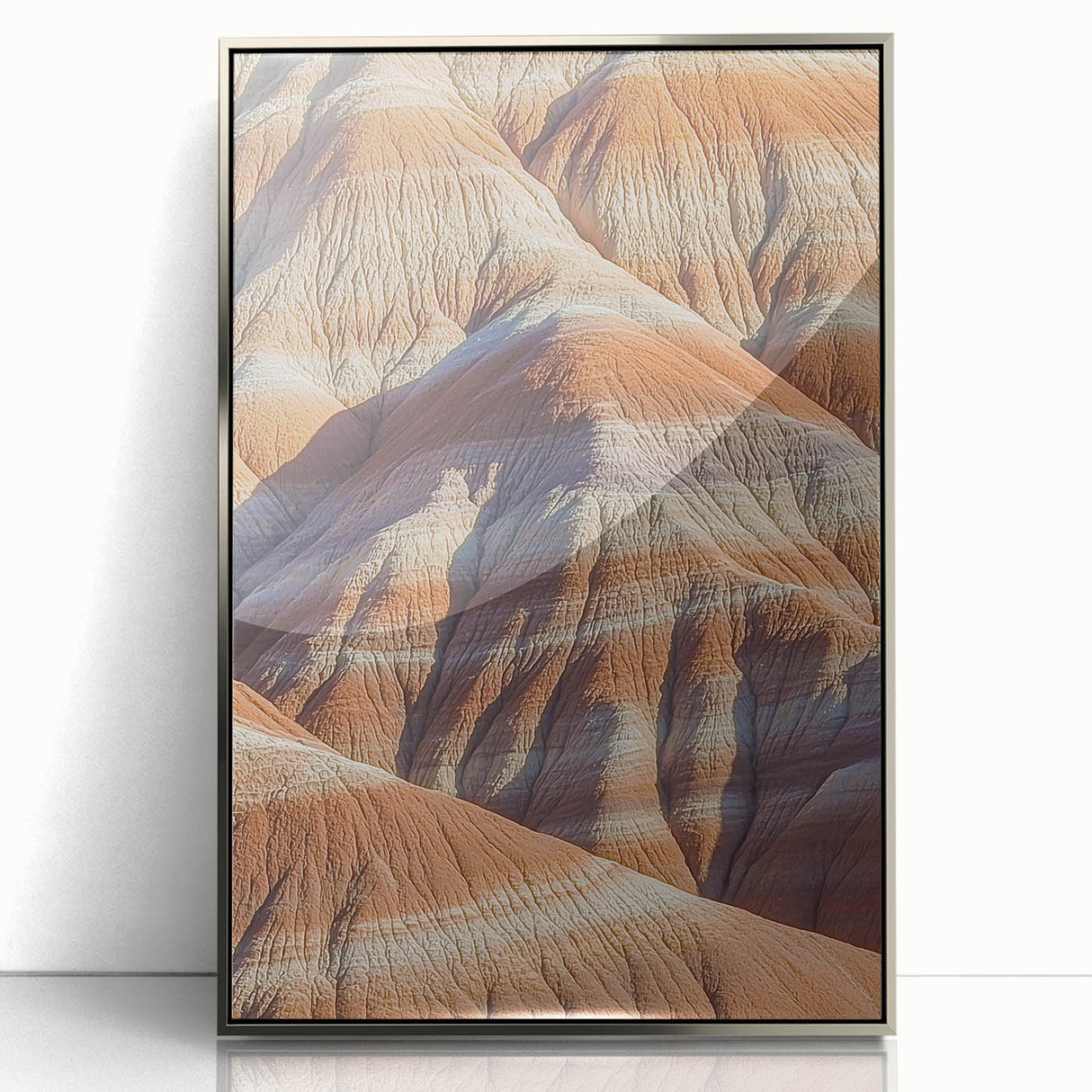 Framed acrylic artwork showcasing a stunning landscape of cliffs, featuring a silver frame that enhances the vibrant colors and intricate details, perfect for modern decor.