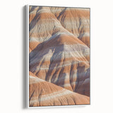Framed canvas artwork depicting majestic cliffs against a vibrant sunset, showcasing intricate details and rich colors, perfect for enhancing home decor.