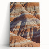 Stretched canvas artwork depicting a serene landscape with dramatic cliffs and vibrant colors, perfect for enhancing home decor in living rooms or offices.