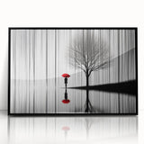 Framed abstract figurative wall art displayed in a sleek black frame, showcasing vibrant colors and dynamic shapes, perfect for modern home decor.