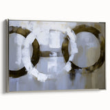 Framed abstract geometric canvas art with a silver border, showcasing a modern design that adds elegance to any room. Ideal for contemporary home decor.