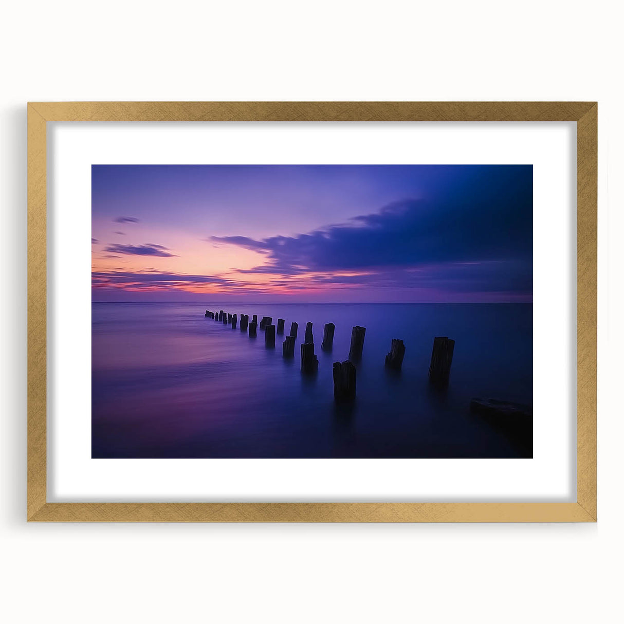 Elegant landscape artwork depicting serene beaches framed in a luxurious gold mat, showcasing vibrant colors and intricate details, perfect for enhancing home decor.