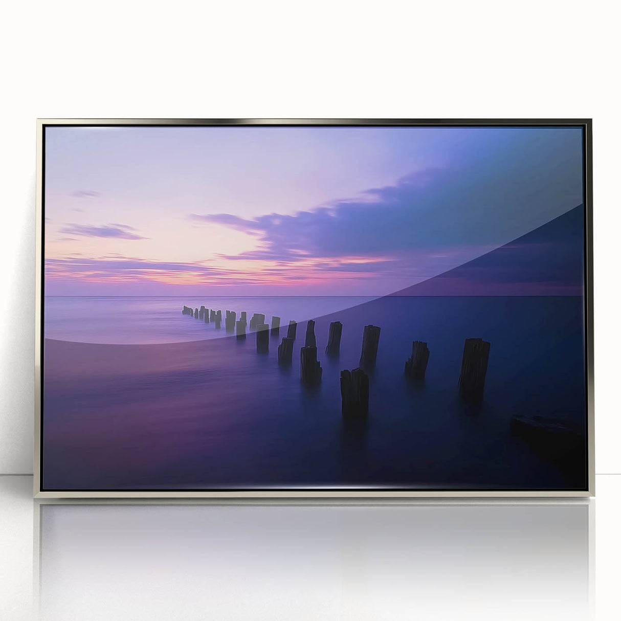 Framed acrylic artwork depicting a serene beach landscape with vibrant blue skies and golden sands, designed to enhance coastal-themed interiors.