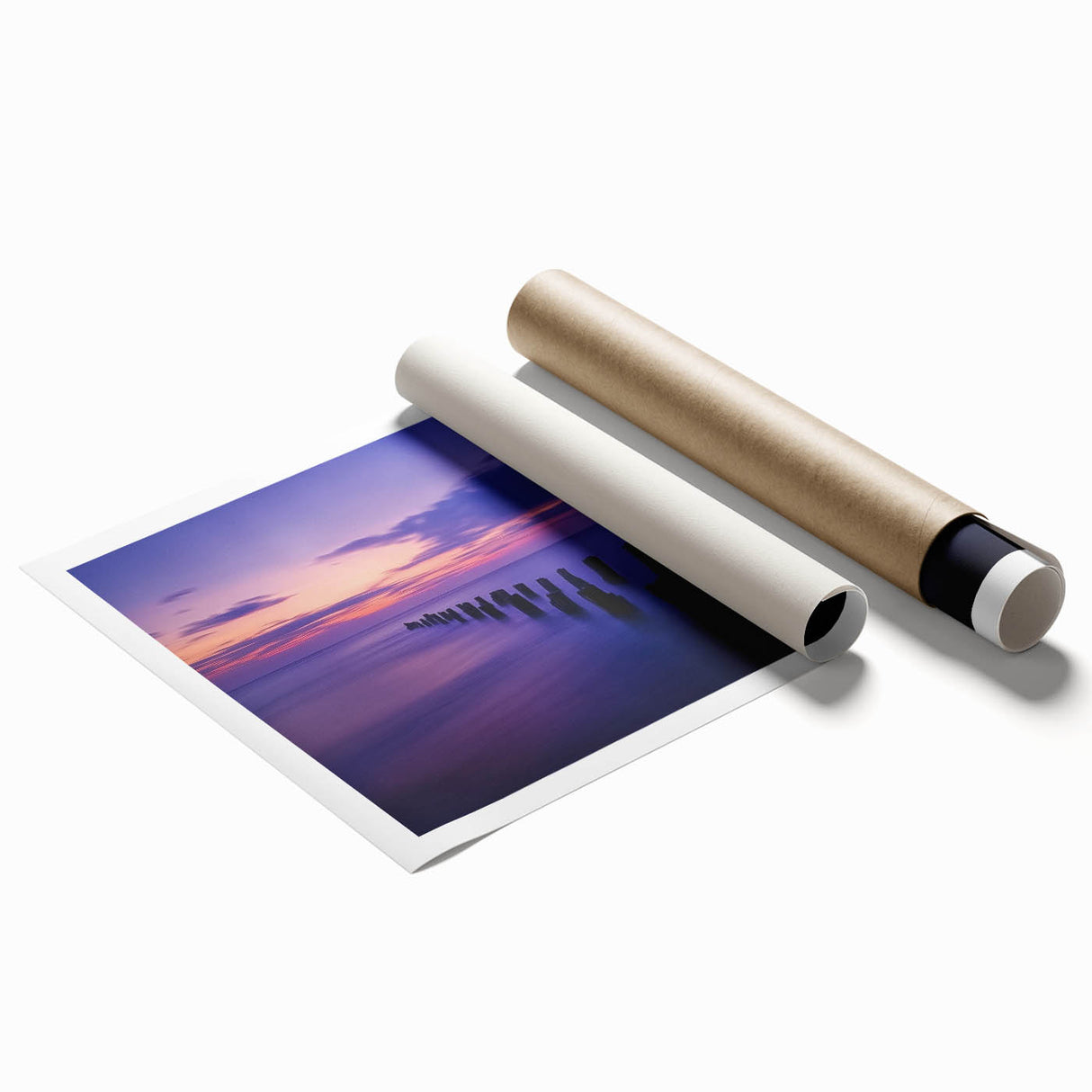 Vibrant rolled print of a serene beach landscape, showcasing golden sands and turquoise waters under a clear blue sky, perfect for home decor.