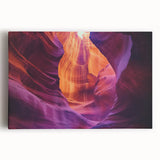 Stretched canvas artwork depicting a stunning landscape of colorful canyons under a bright blue sky, perfect for adding a vibrant touch to any room decor.